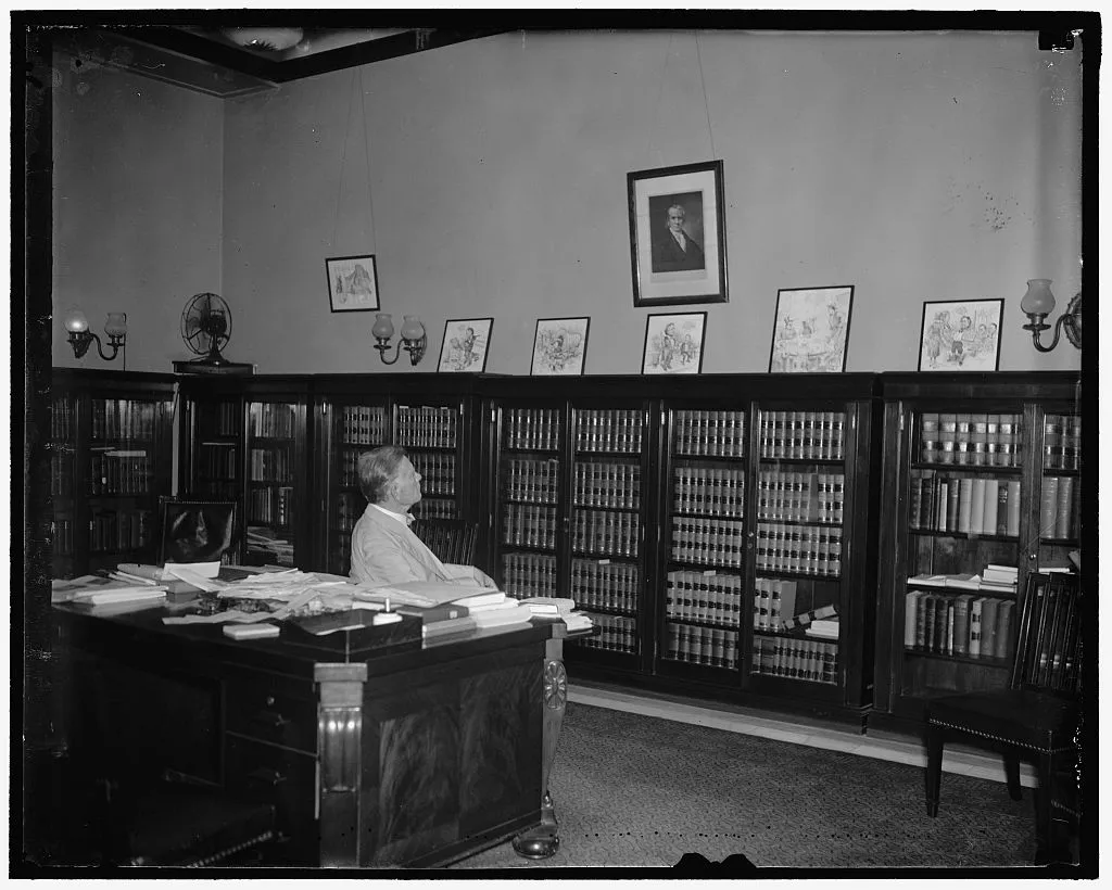 Senator William E. Borah of Idaho at his desk.