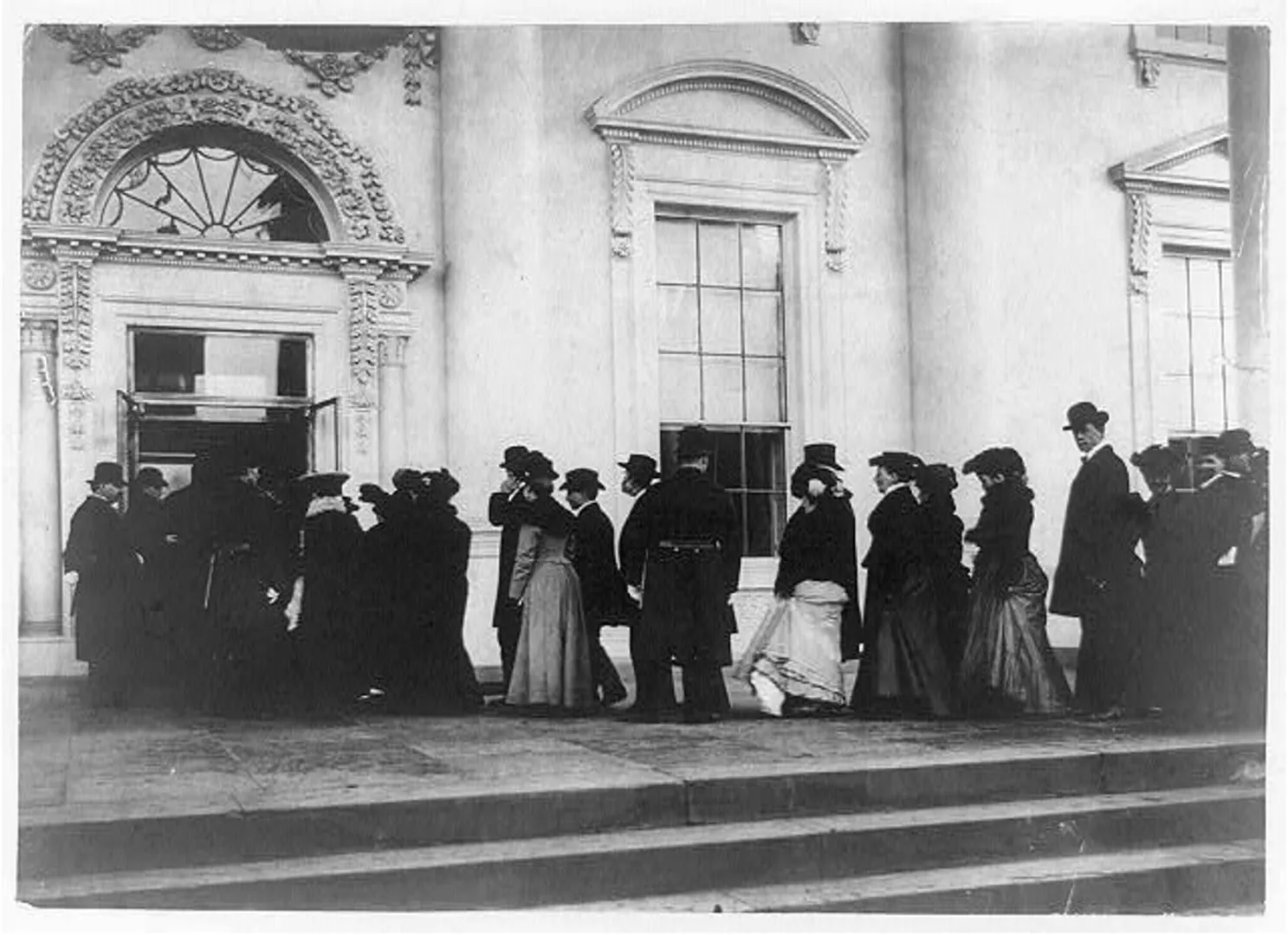 Members of the public lining up to enter the White House for a New Year's reception, between 1900 and 1910