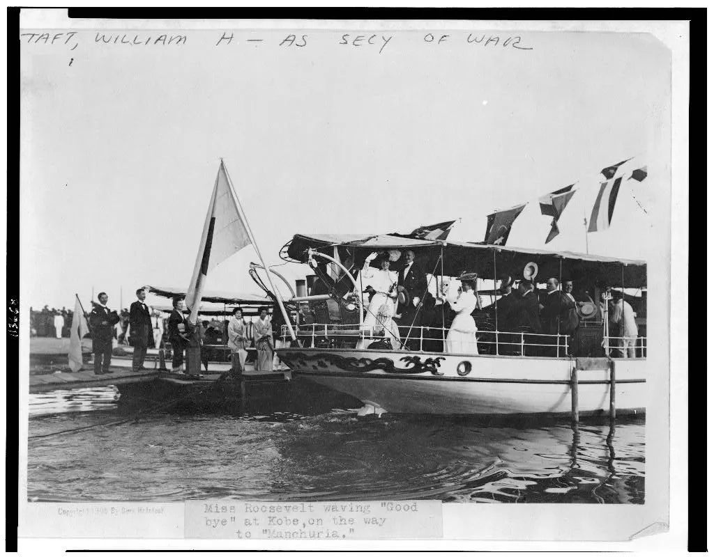 Alice Roosevelt waving good-bye from a ship at Kobe.