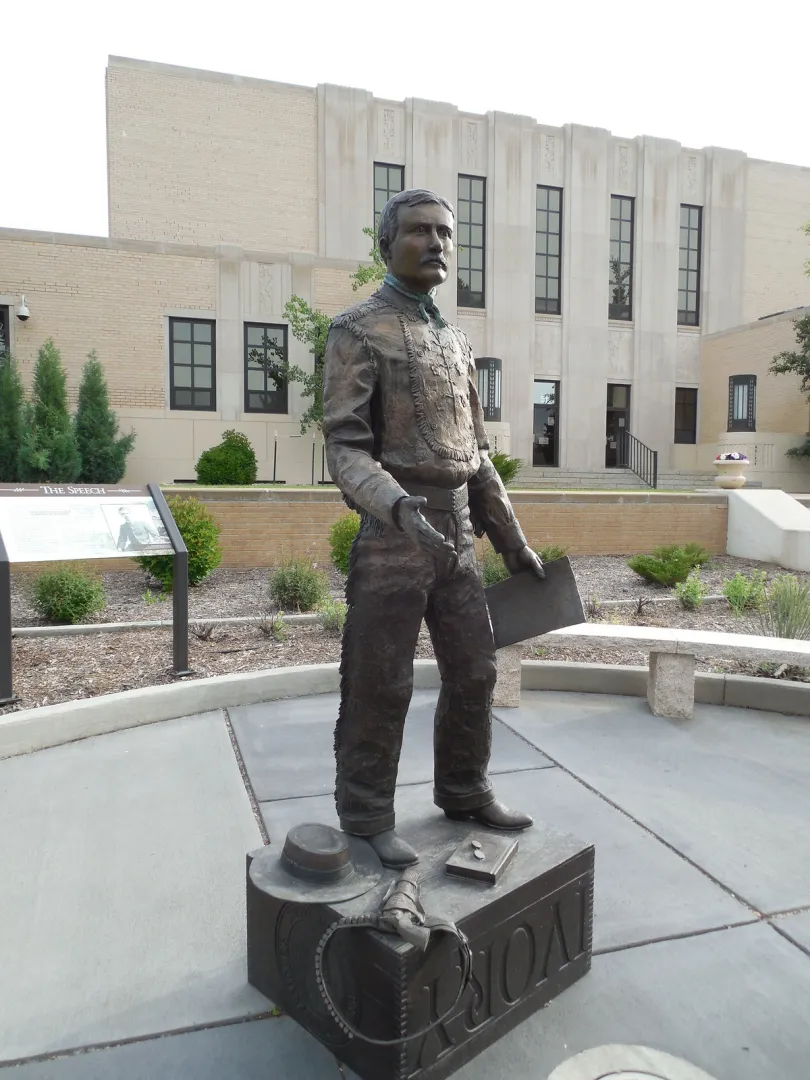 Bronze statue of a young Theodore Roosevelt in front of the Stark County Courthouse