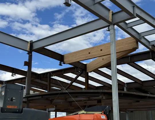 The mass timbers in place married with the steel beams