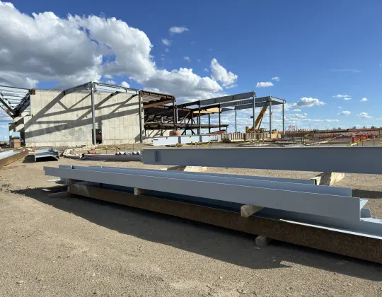 Steel beams arriving daily