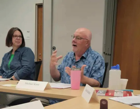 Photograph of a teacher speaking