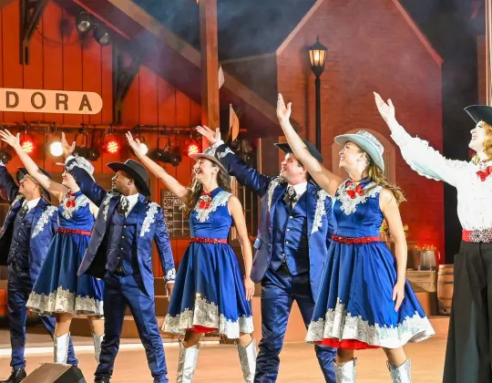 Medora Musical cast performing in front of the MEDORA set