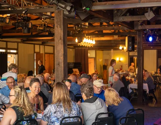 Town Square Showhall interior with a brunch crowd at tables
