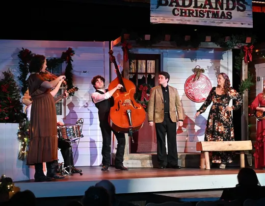 Medora Musical Christmas ensemble on stage