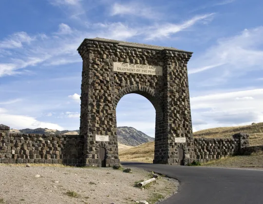 The stone Roosevelt Arch at the North Entrance of Yellowstone National Park