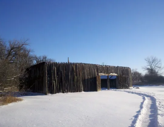 The log stockade of the reconstructed Fort Mandan in winter