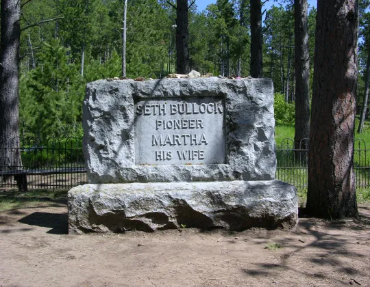 The stone grave marker of Seth and Martha Bullock at Mount Moriah Cemetery
