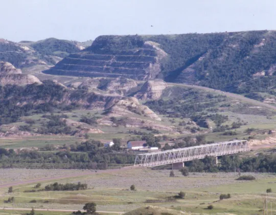 U.S. 85 crossing the Little Missouri River below badlands