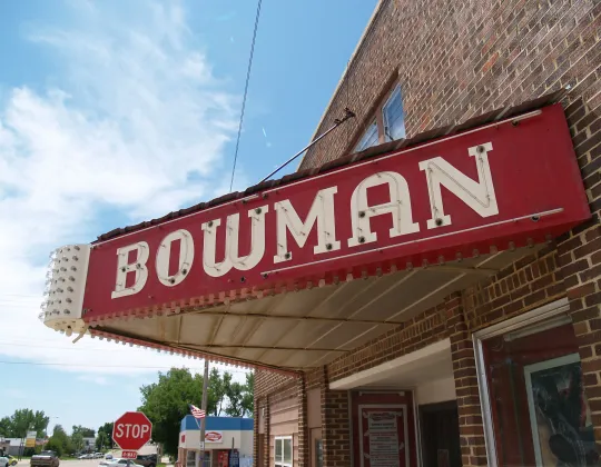 A storefront sign on Main Street in Bowman, North Dakota