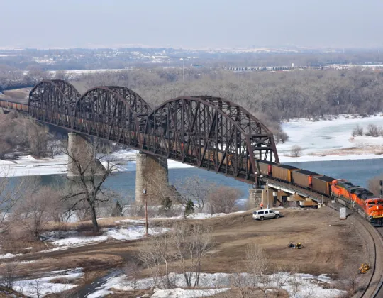 A long steel railroad bridge over the Missouri River at Bismarck