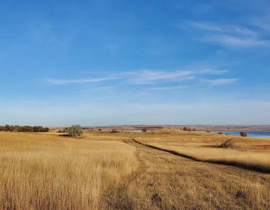 Rolling prairie and water near New Town, North Dakota