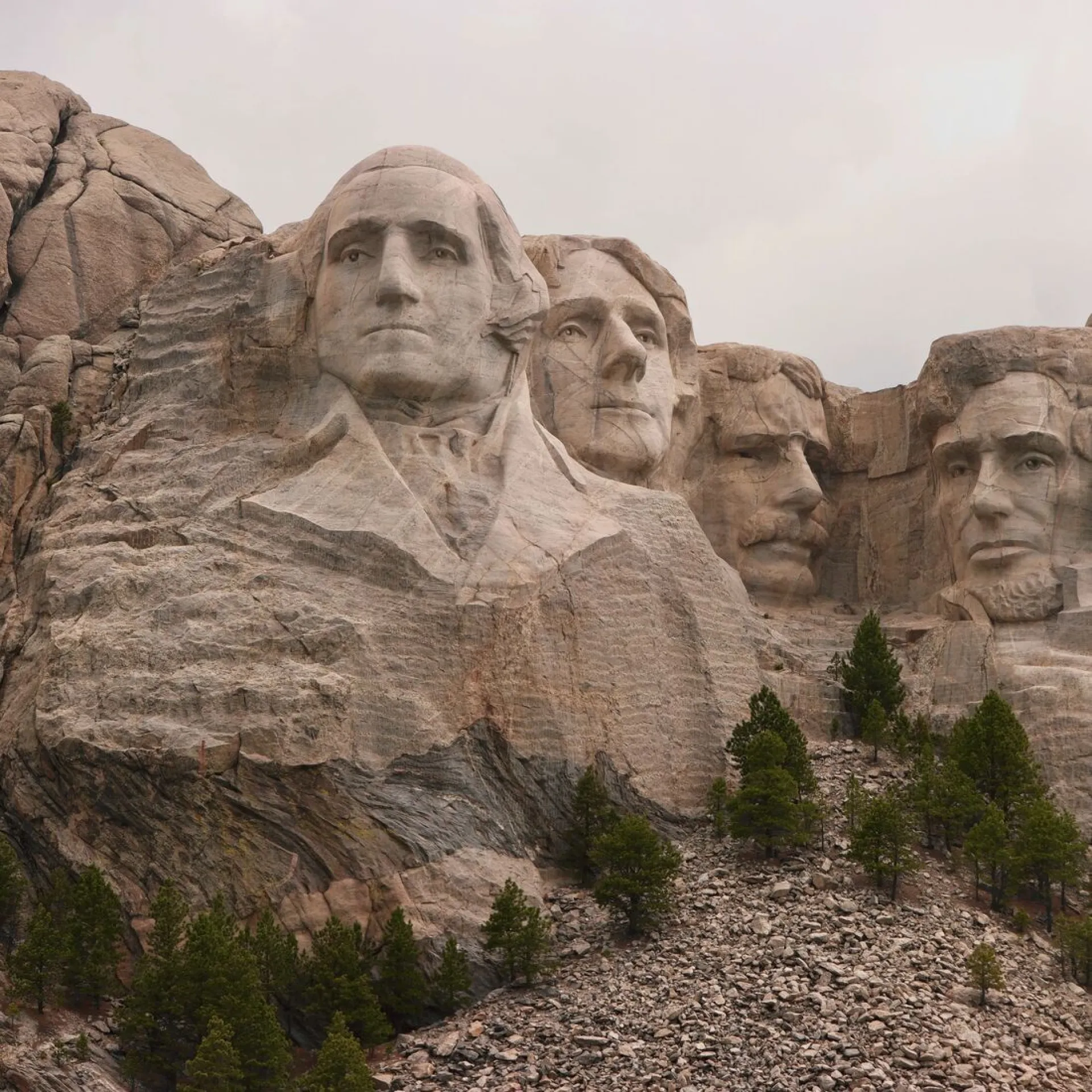 The four presidential faces of Mount Rushmore, with Theodore Roosevelt carved between Jefferson and Lincoln